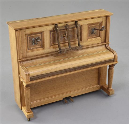 Denis Hillman. A Victorian style walnut miniature upright piano, width 5in.